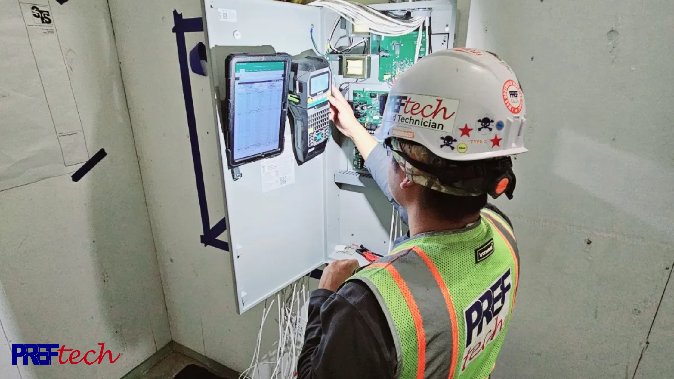 a security technician installing security systems